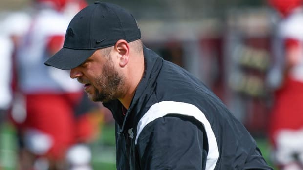 Razorbacks tight ends coach Morgan Turner on the outdoor practice field March 30, 2023